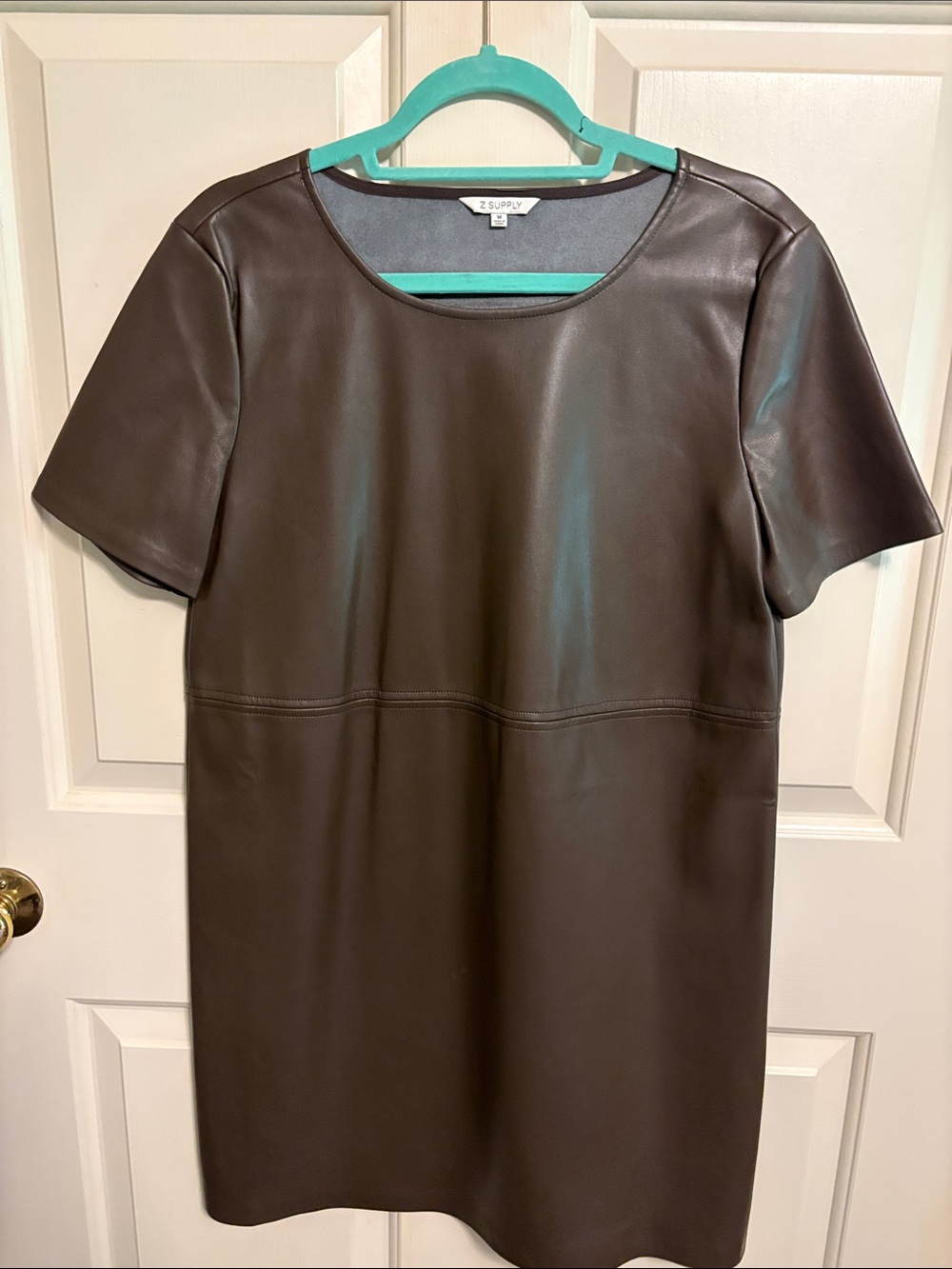 Knee-length faux leather dress; looks amazing with boots!